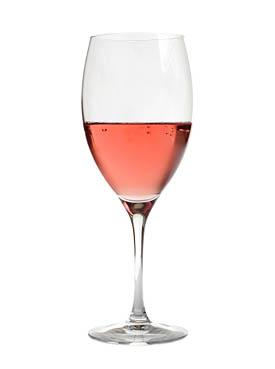 rose wine in crystal glass, isolated on white